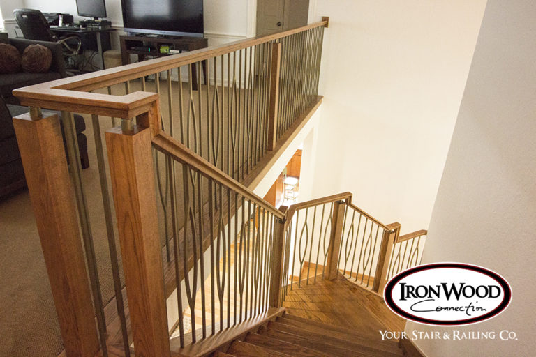 Traditional wood stair by Ironwood Connection
